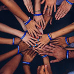 many hands together